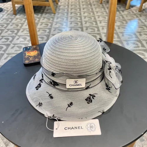 CHANEL STRAW HAT WITH CHIFFON FLOWER VINTAGE GRAY 672759