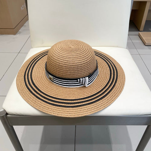 CELINE WIDE BRIM HAT MODEL 650410 IN BROWN WITH BLACK STRIPES WOVEN STRAW